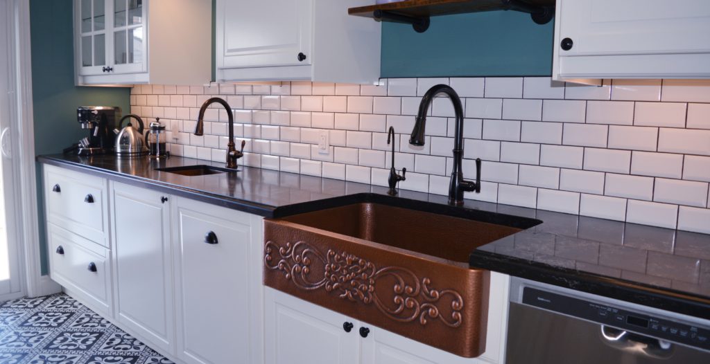 2 copper sinks with bronze faucets really bring the Victorian feel to life!